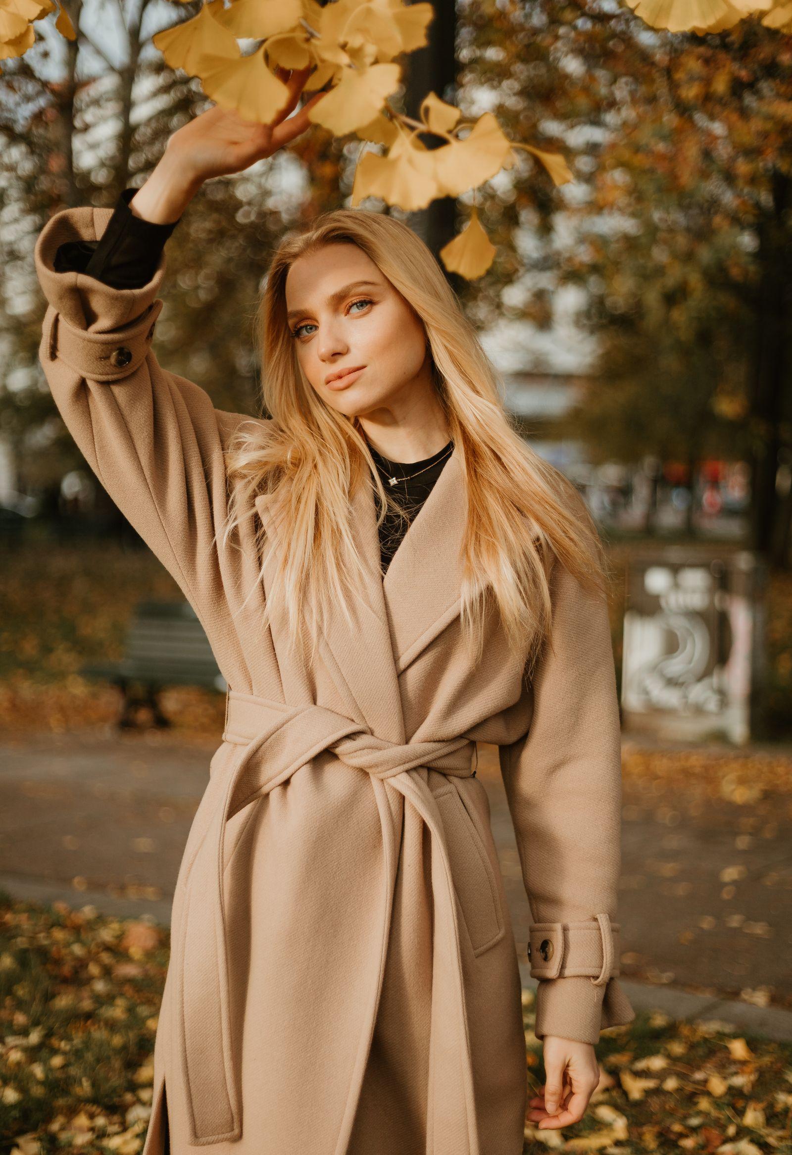 A coat worn outdoors in late-season light